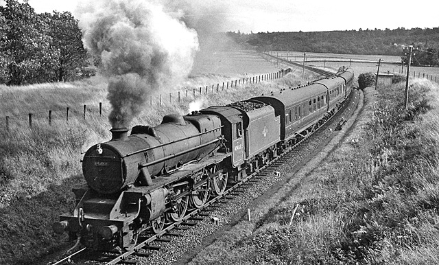 A steam-hauled Glasgow to Oban express curving through the Pass of Leny near Callander in 1961